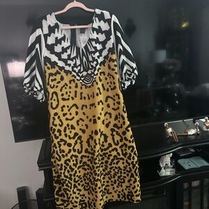 Brand new Ashley Stewart short sleeve dress. Beautiful pattern and color